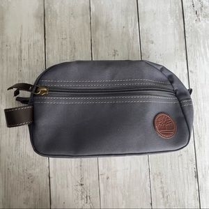 PREOWNED TIMBERLAND ZIP TOP POUCH GREY BROWN